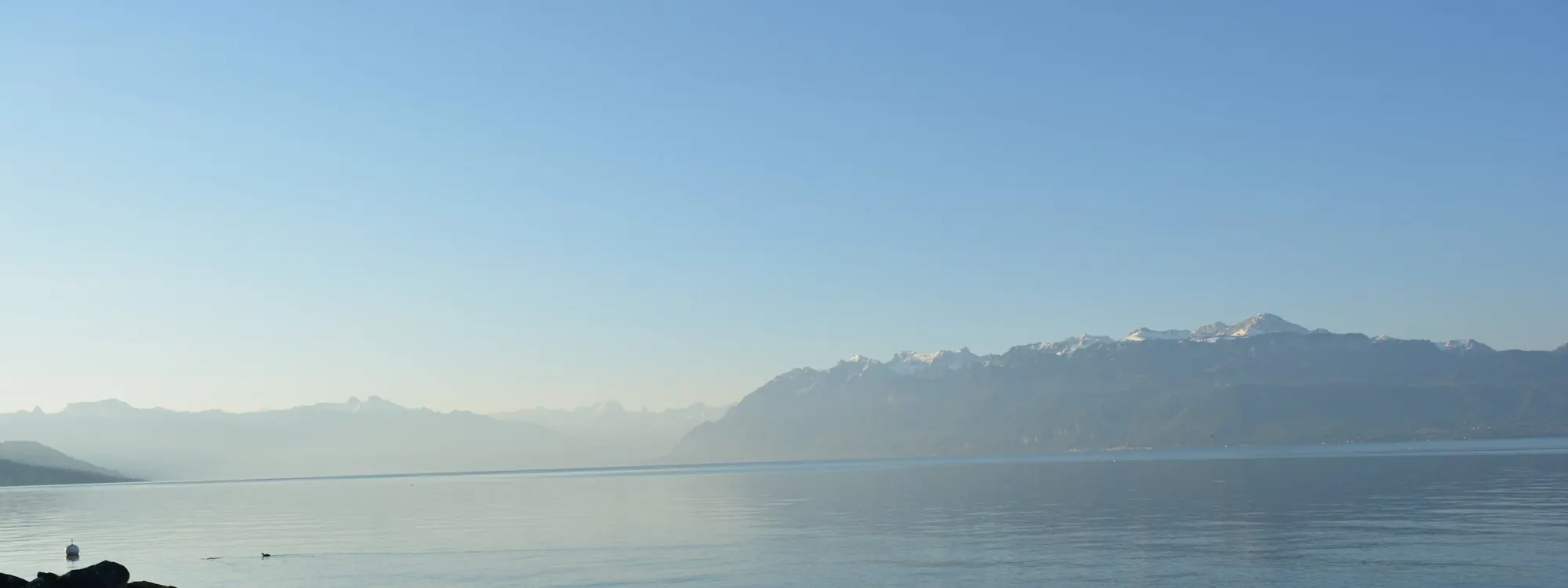Lake Geneva in the morning, the Alps in the distance
